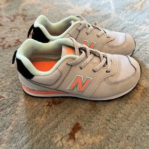Like new!  New Balance sneakers toddler size 10 but fits more like a 9